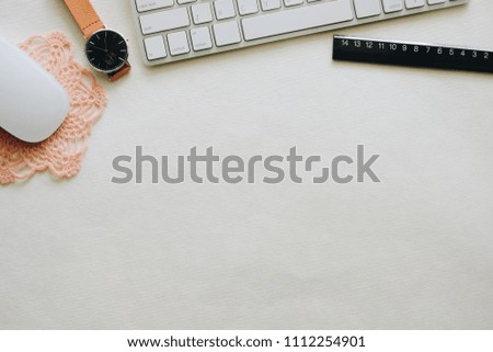 Creative photo with mouse, ruler and keyboard with white background , minimal style