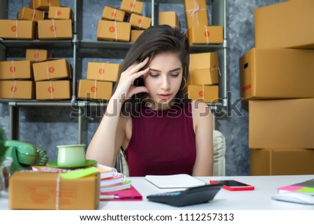 Young woman business entrepreneur, Unhappy of work , Failure in business. Royalty-Free Stock Photo #1112257313