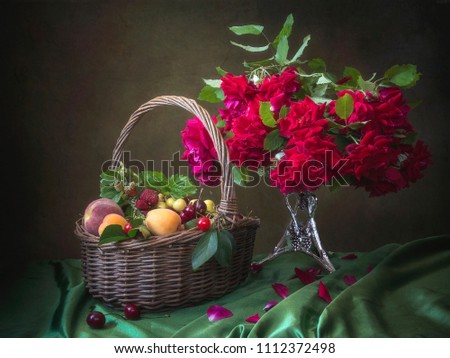 Still life with bouquet of magenta roses and fruits