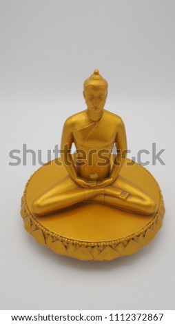 Buddha statue golden white back ground
