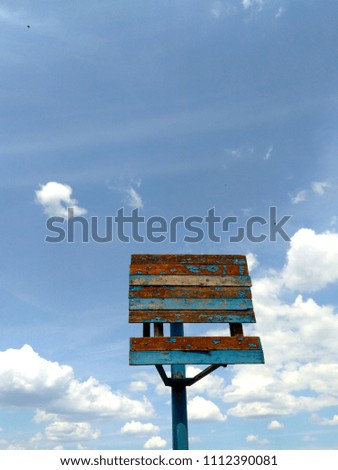old sports equipment, background for design, basketball ring against the sky, blue sky