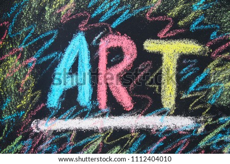 The text of the art is drawn with colorful chalk on a chalkboard.