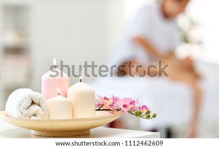 composition of spa candles and white towels
 Royalty-Free Stock Photo #1112462609