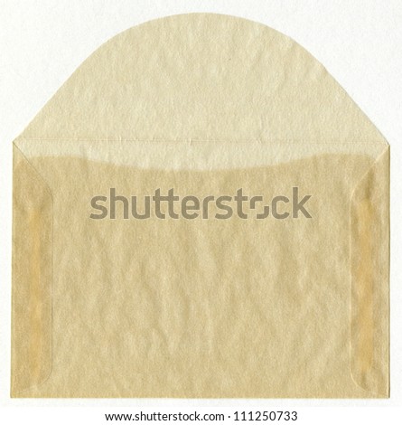 Open Old Used Vintage Glassine Envelope to store stamps, pictures etc. isolated on white background (from very thin and smooth paper that is air and water resistant).