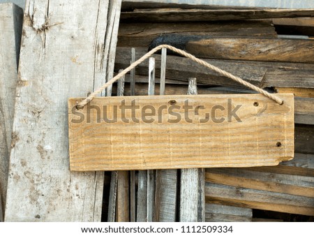 Wide old boards, empty wooden vintage sign, place for the inscription.