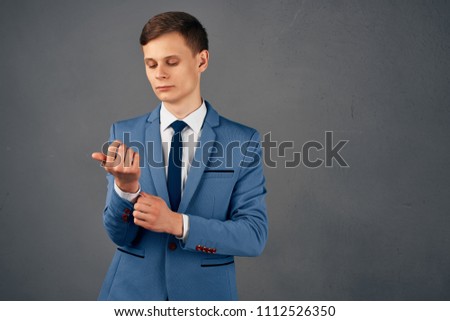  Gentleman blue jacket and tie                              