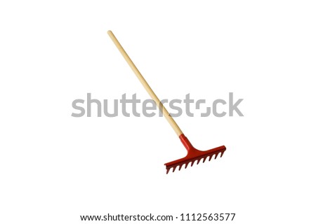 Rake for work in agriculture isolated on white background Royalty-Free Stock Photo #1112563577