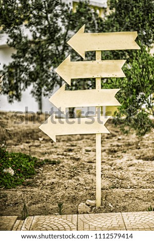 direction indicator. wooden signpost.