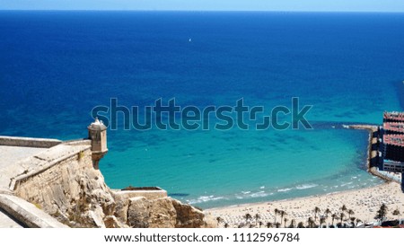 View from Santa Barbara fortress in Alicante to the sea and beach                              