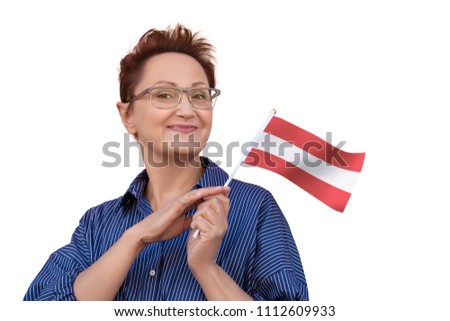 Woman holding flag of Austria. Nice portrait of middle aged lady 40 50 years old with a national Austrian flag isolated on white background. Travel to Austria concept. Austrian people