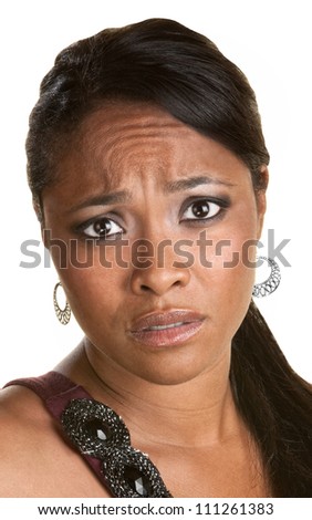 Close up of worried Black woman on isolated background