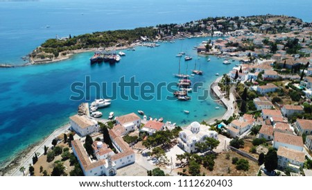 Aerial drone bird's eye view photo of picturesque church of Agios Nikolaos in historic and traditional island of Spetses, Saronic Gulf, Greece