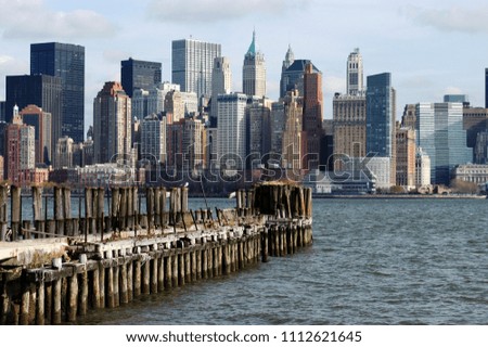 Rotting Pier and New York City Skyline