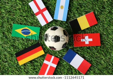 Football and national flags 2018 on Green grass Top view Royalty-Free Stock Photo #1112645171