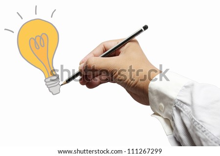 hand with a pencil drawing light bulb