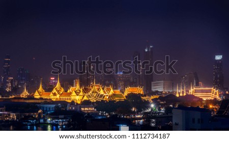scenic of night royal grand palace of thailand with cityscape background skyline