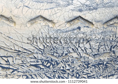 Abstract white color ruin on old black rubber surface texture background