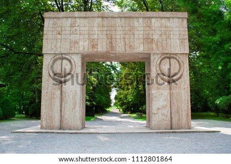 The Gate Of The Kiss, located in Targu Jiu city, Romania, is one of the most important works of sculptor Constantin Brancusi. On each side of the arch the pillars have carved the symbol of kiss.