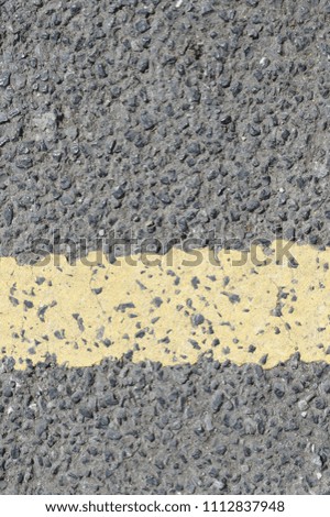 yellow line on road texture photo