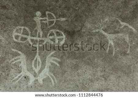 An image of an ancient man's hunting on the wall of a cave. era, era, archeology.