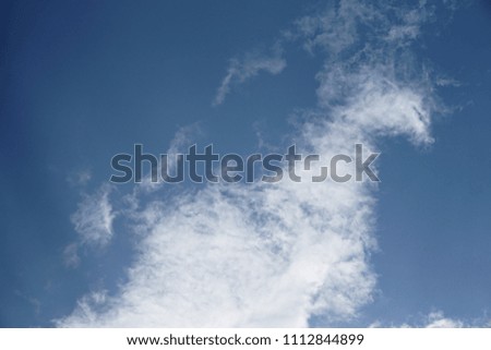 Amazing clouds on the background of blue sky, Spring in GA USA.