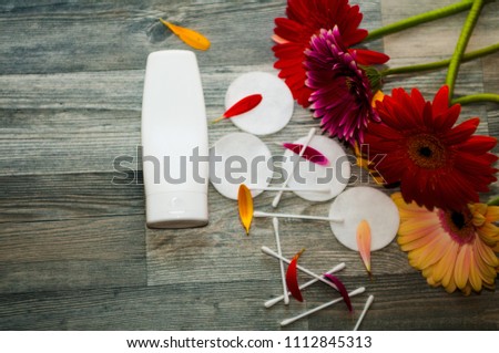 Cosmetic magazine template, fresh herbs products on marble stone and wood plate texture, illustration Cosmetics with flowers