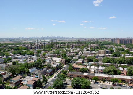 View of the Bronx With Manhattan Skyline in Background