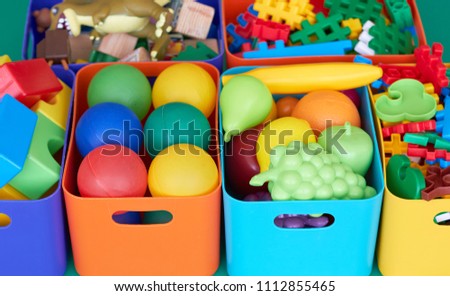 Colored boxes with toys.