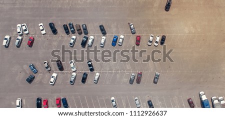 Parking near the shopping center. View from a height. Aerial photography