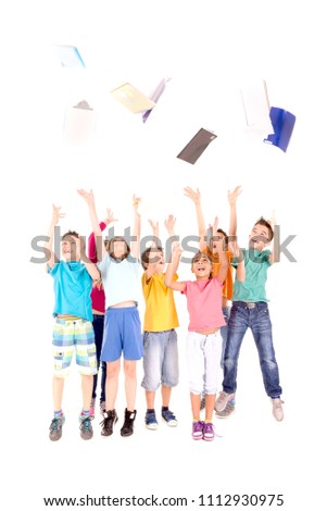 little kids at school isolated in white