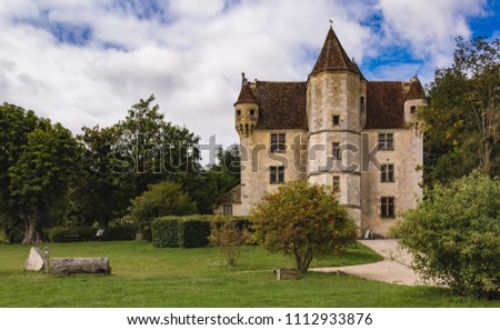 French Castle in rural france in the summer Royalty-Free Stock Photo #1112933876