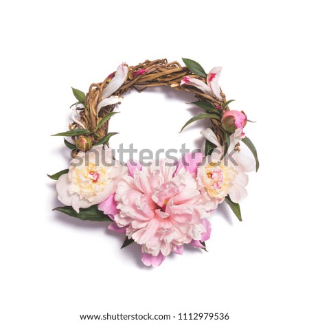 Wreath of pink peony flowers isolated on white background