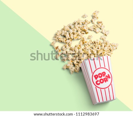 Flat lay of cinema items and popcorn