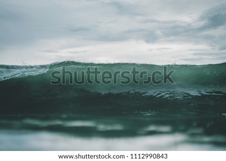 Surf seascape of wave breaking head on