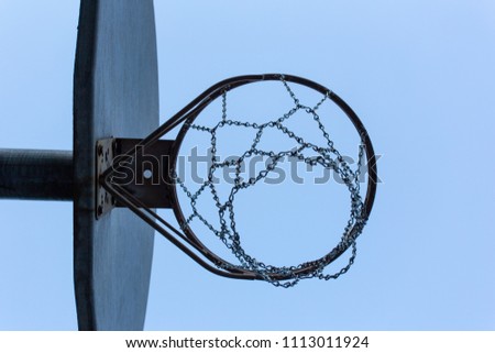 looking up at basketball hoop