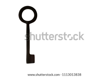 Antique black door key isolated on white background.