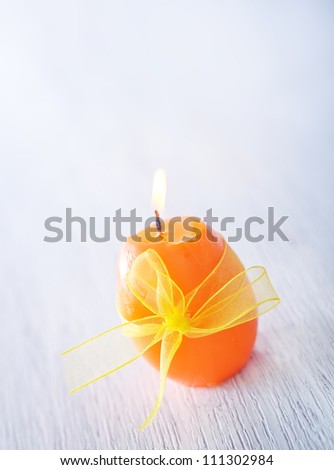 candle with ribbon