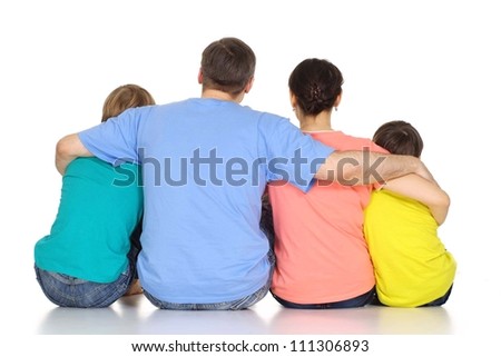 Glad family having fun in bright T-shirt on a white background