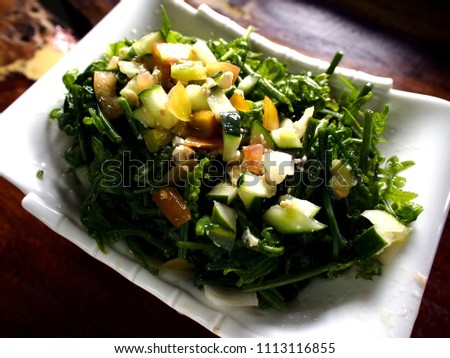 Photo of a plate of Pako Salad or Fiddlehead Fern Salad