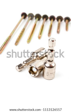 Close up HEX Drive magnetic drill bit socket driver (8mm) with roofing screw isolated on white background.