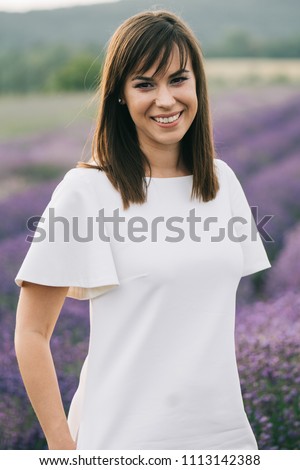 Happy brunette woman outdoor