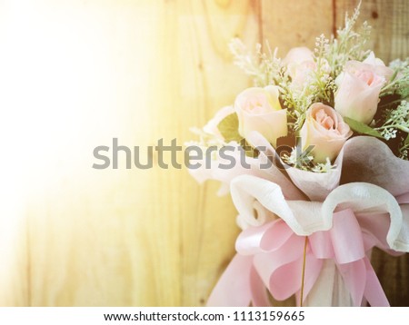 Beautiful flower bouquet with wood background