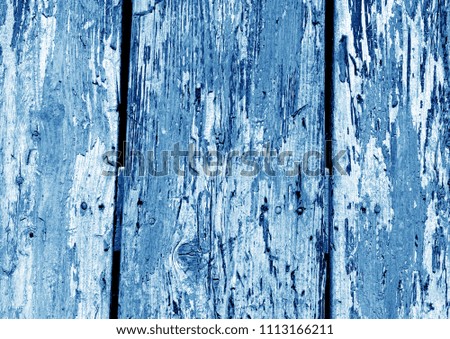 Grunge wooden fence pattern in navy blue color. Abstract background and texture for design.