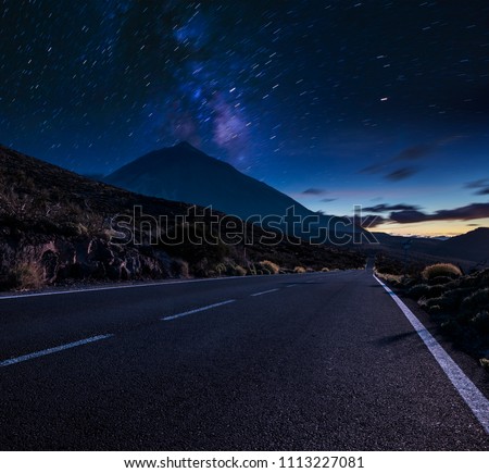 Night mountain road .Night sky with milky way and stars.