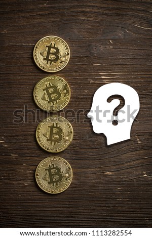 bitcoins on wooden background