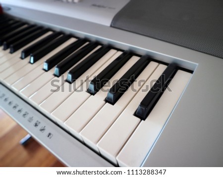closeup of the electric piano with sunlight
