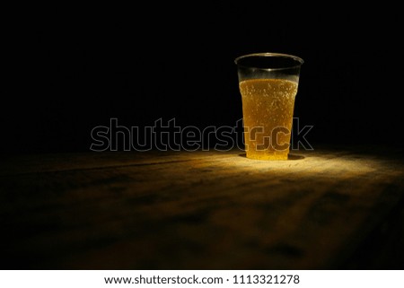 Cold Beer Glass on Old Wood Table