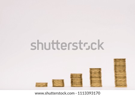 inflation concepce. Coins increasing value chart with arrow. Company growth image. income company. White background.