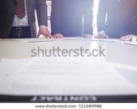 Businessman teamwork discussing together with sign a contract during meeting in office room, working with colleagues.
