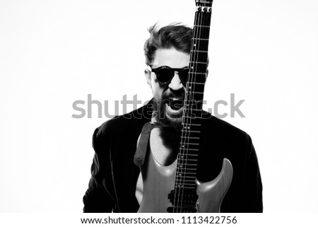 emotional man with a guitar                              